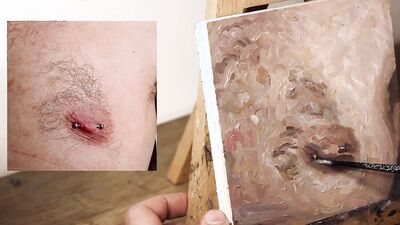 Armando Cabba is paintng a nipple in this homemade video