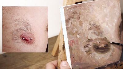 Armando Cabba is paintng a nipple in this homemade video