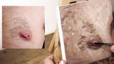 Armando Cabba is paintng a nipple in this homemade video