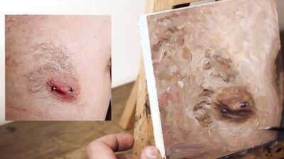 Armando Cabba is paintng a nipple in this homemade video