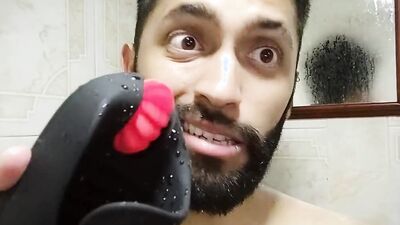Horny dude is stroking his prick with a tight gummy toy
