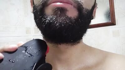 Horny dude is stroking his prick with a tight gummy toy