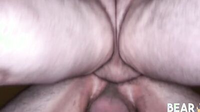 Two naughty amateur bears are playing with each other's pecker
