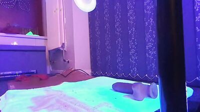 Mike gets ass fucked on the machine whilst locked in glowing chastity