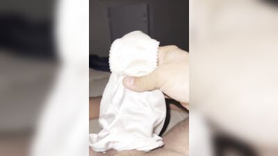 Horny dude is teasing his tiny pecker with a panties