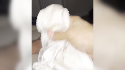 Horny dude is teasing his tiny pecker with a panties