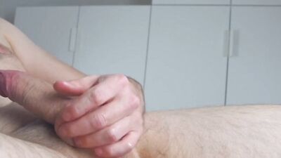 Close-up video of a chap stroking his hard willy