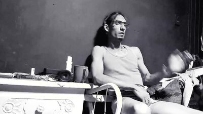 Raba Erre plays with his dick while smoking a cigarette