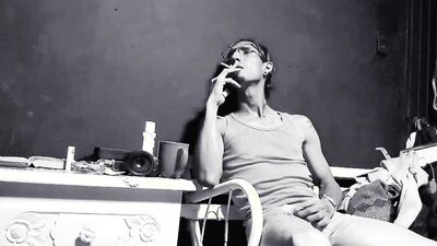 Raba Erre plays with his dick while smoking a cigarette