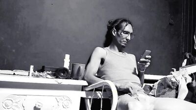 Raba Erre plays with his dick while smoking a cigarette