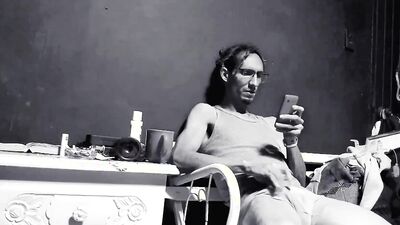 Raba Erre plays with his dick while smoking a cigarette