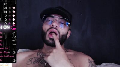 Horny bearded bloke is having some fun in front of the cam