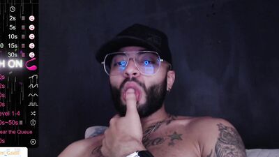 Horny bearded bloke is having some fun in front of the cam