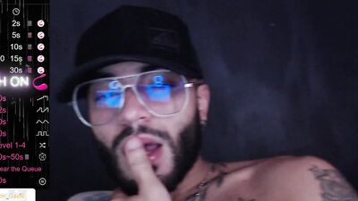 Horny bearded bloke is having some fun in front of the cam