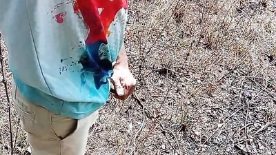 Amateur lad strokes his hard pecker out in the open