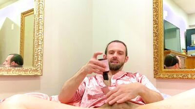 Perverted bearded bloke plays with his ass in this video