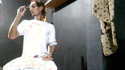 Raba Erre plays with his pecker while smoking a cigarette