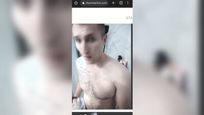 Young college guy having fun in the shower
