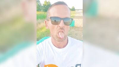 Horny dude strokes his dick in public while smoking a cigarette