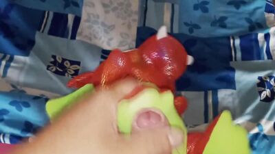 Perverted bloke is rubbing his pecker on a favorite dragon toy
