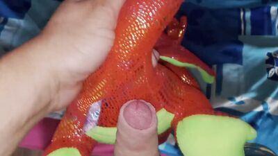 Perverted bloke is rubbing his pecker on a favorite dragon toy