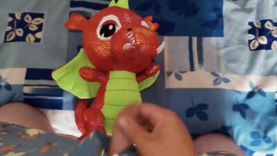 Perverted bloke is rubbing his pecker on a favorite dragon toy