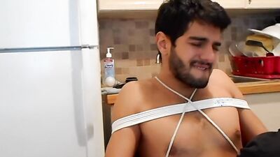 Sebastian Cums gets a blowjob while tied to a chair