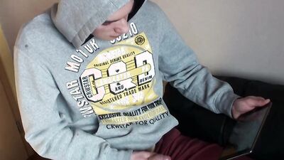 Cute gay guy passes the time with erotic masturbation until he comes to cum