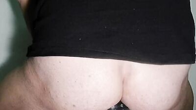 inserting large plugs and dildos in the ass