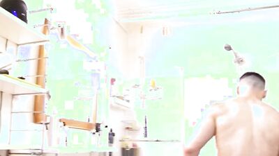 Beautiful fitness male gets filmed hard in a shower.