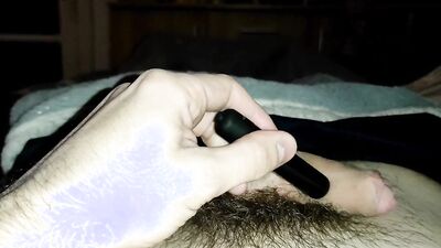 Croat playing with foreskin vibrator on frenulum cum leak