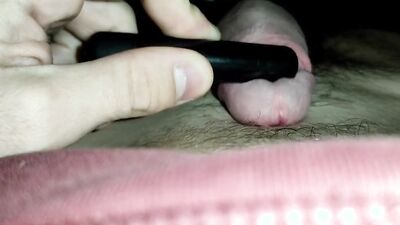 Croat playing with foreskin vibrator on frenulum cum leak