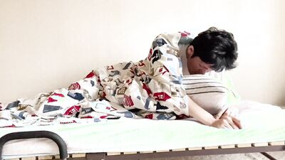 Perverted Japanese boys rubbing their cocks on the bed.