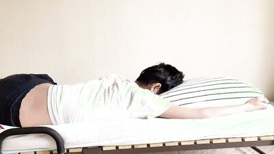 Perverted Japanese boys rubbing their cocks on the bed.