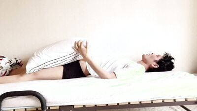 Perverted Japanese boys rubbing their cocks on the bed.
