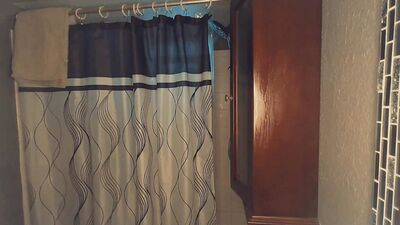 Redhead amateur edges his partially hard cock and moans for you after taking a shower