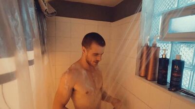 Redhead amateur edges his partially hard cock and moans for you after taking a shower