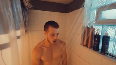 Redhead amateur edges his partially hard cock and moans for you after taking a shower