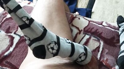 Nerdy college boy masturbates after classes and he likes to cum in his socks!