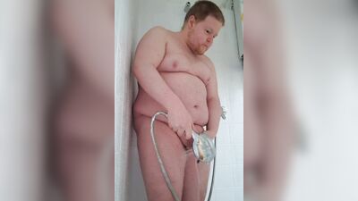 Naked boy sings in the shower