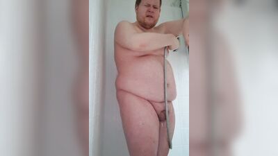 Naked boy sings in the shower