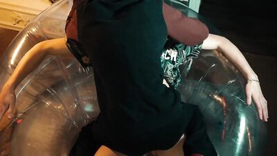 Two sweet guys share an inflatable chair