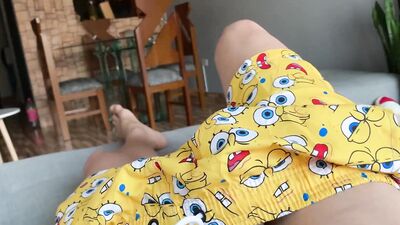 Hot latin guy jerk off in the couch POV till he cums wearing spongebob's pants