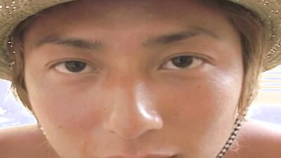 Young japanese guy posing in front of camera while jerking his cock until he cums