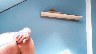 Little femboy playing with his orange dildo