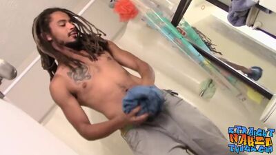 Amateur black dude is jerking his prick in the shower