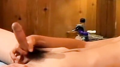 Amateur skinny twinks are jerking their cocks in a bedroom