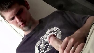 Amateur bloke is smoking a cigarette and jerking his cock