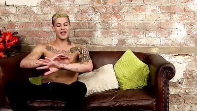 Young jock Mickey Taylor shows off tattoos before wanking