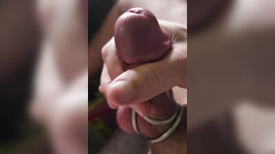 Closeup stroking of hard mushroom tipped dick